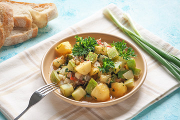 Braised zucchini with vegetables and sesame seeds. Rustic delicious cuisine.
