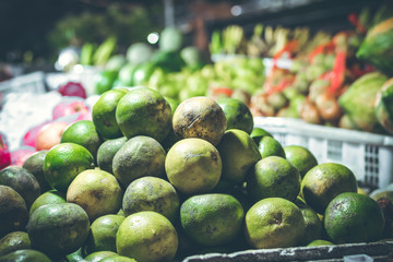 Fresh organic mandarins on the night market. Bali island.