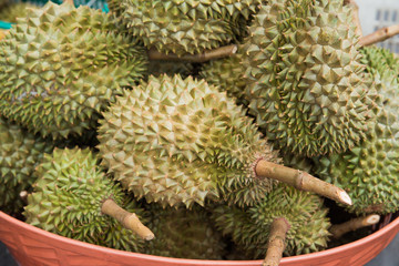 Naklejka na ściany i meble Fresh durians in the basket, king of fruit, Thailand 