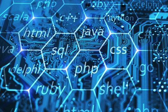Programming language and development of applications concept on blue integrated circuit. Training courses of php, sql, html, css and other disciplines.