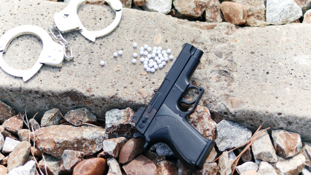 BB&nbsp;gun&nbsp;and&nbsp;handcuffs&nbsp;on&nbsp;the&nbsp;floor.