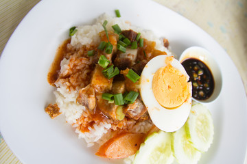 Barbecue pork and roasted pork with stream rice.Thai food