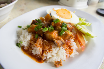 Barbecue pork and roasted pork with stream rice.Thai food