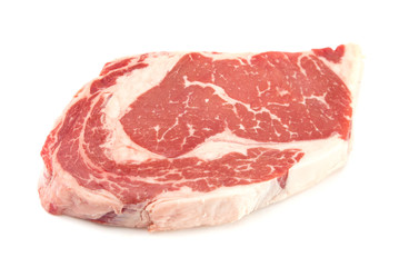 Raw Rib Eye Steak on a White Background