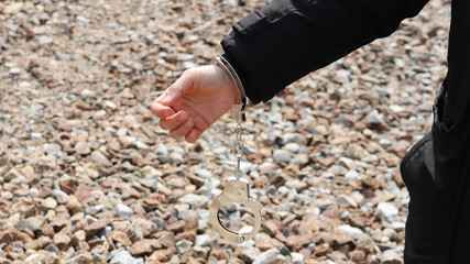 Put handcuffs on criminals.