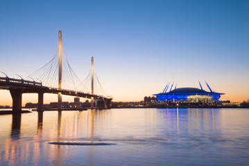 Cable-stayed bridge over the Petrovsky fairway in the night scenery, Saint-Petersburg