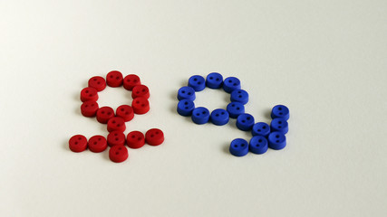 The symbol of the red woman and the symbol of the blue man.