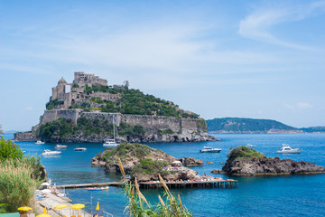 Fototapeta na wymiar Ancient castle on the island in the blue sea