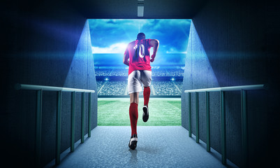 Fußballspieler betritt das imaginäre 3D-Stadion