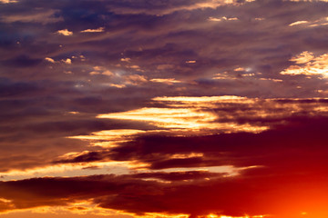 colorful dramatic sky with cloud at sunset.