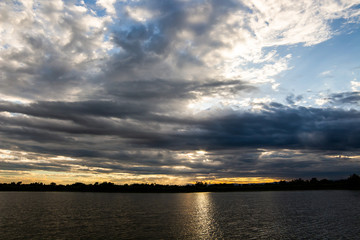 colorful dramatic sky with cloud at sunset.