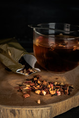 aromatic fruit tea on a wooden board
