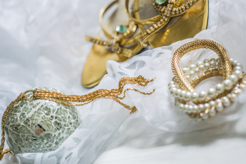 wedding details, gold and silver jewelry, shoes