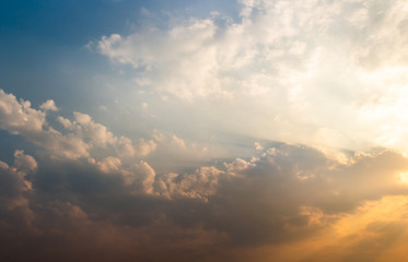 colorful dramatic sky with cloud at sunset.