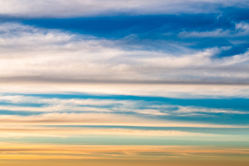 colorful dramatic sky with cloud at sunset.