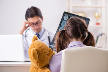 Little girl visiting doctor for regular check-up