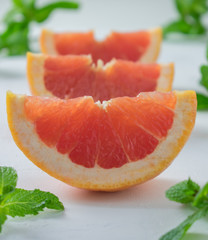 Sliced fresh ruby red grapefruit