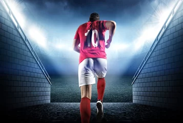 Poster Soccer player entering the 3d imaginary stadium © efks