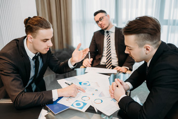 tired of business. vacant blank look. indifferent uninterested ineffective worker. professional inefficiency. unconcerned man bored at company meeting.