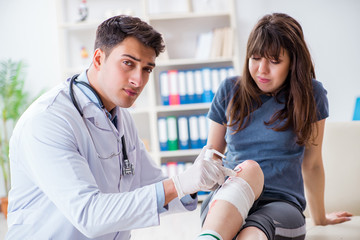 Fototapeta premium Patient visiting doctor after sustaining sports injury