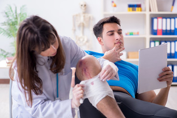 Patient visiting doctor after sustaining sports injury