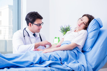 Fototapeta premium Doctor doing medical injection in hospital room