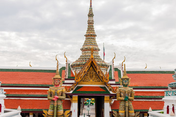 Fototapeta premium Temple of the Emerald Buddha is Wat Phra Kaew or Wat Phra Si Rattana Satsadaram. It is regarded as the most sacred Buddhist temple (wat) in Thailand.
