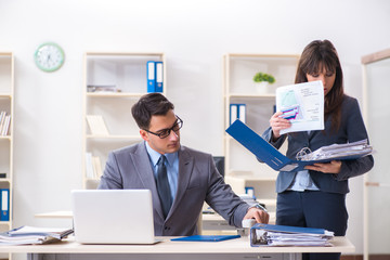 Man and woman working in the office