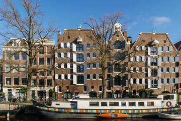 Beautiful Architecture Of Dutch Houses and Houseboats On Amsterdam Canal In Autumn