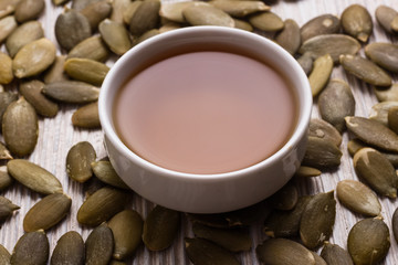 pumpkin seed oil on a rustic background