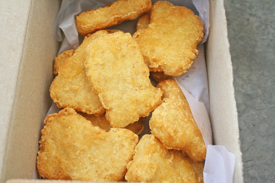 Chicken Nuggets In Open Box On Table Background , Take Away