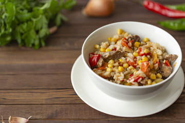 Delicious homemade wok fried rice with meat and vegetables