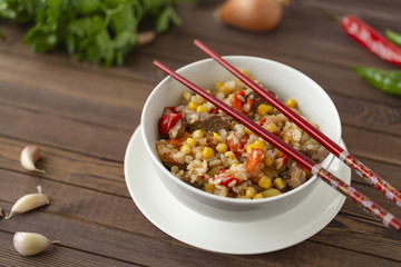 Delicious homemade wok fried rice with meat and vegetables