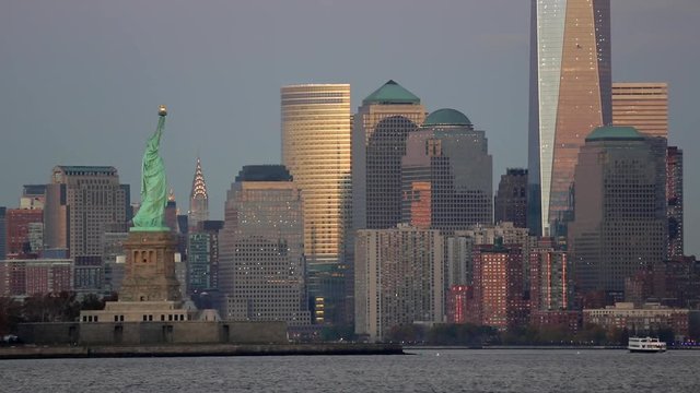 Statue of Liberty, One World Trade Center and Downtown Manhattan across the Hudson River, New York, Manhattan, United States of America
