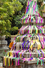 Buddhist architecture in Wat Damnak pagoda, Siem Reap, Cambodia. Ancient funeral stupa with ribbon decor.