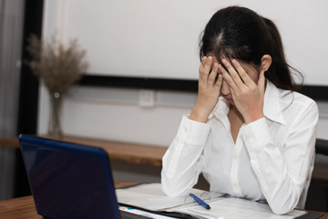 a woman in feeling exhausted and depressed from frustrated. anxiety concept.