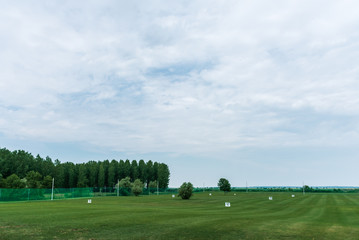 Fototapeta na wymiar green grass on golf courses with balls