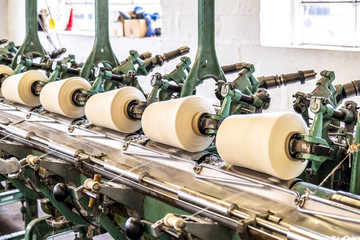 Cop winder of historic woolen mill production in Wales - United Kingdom