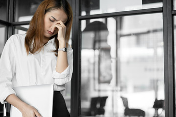 a woman in feeling exhausted and depressed from frustrated. anxiety concept.