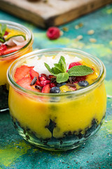 Black rice, mango pulp and berry fruits jar