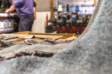 Historic woolen mill production background with Tweed