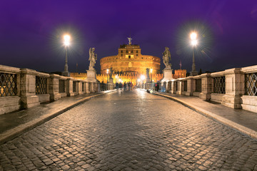 Plakat Night view of Saint Angel Castle and bridge over the Tiber river in Rome, Italy. Night cityscape of Rome. 