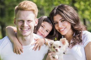 Happy family with a dog