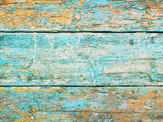 Fototapeta na wymiar Texture of an old wooden wall. Background