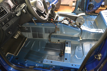 Tuning the car in a pickup truck body with three layers of noise insulation on the floor, under the seats, doors and on the rear wall. 
