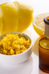 Lemon essential oil on a white background