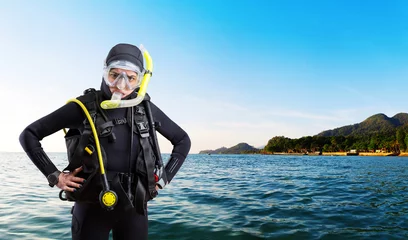 Wall murals Diving Female diver sportsman in wetsuit and diving gear