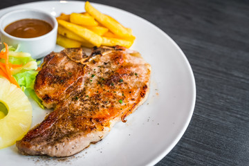 kurobuta pork chop with vegetable and french fries