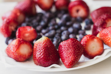 Strawberry and blueberry on the plate
