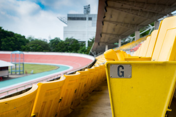 Yellow seat, row G in velodrome